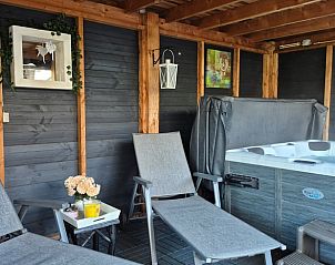 Vakantiehuisje in Dalerveen met ruime tuin en terras, gelegen in het groene Zuidoost Drenthe, ideaal voor een ontspannen verblijf in de natuur.