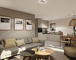 Woonkamer met open keuken in de vakantiewoning in Emmen, Zuidoost Drenthe.