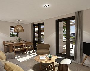 Gezellige zithoek met uitzicht op terras in de vrijstaande woning in Emmen.