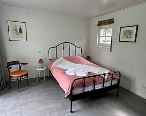 Slaapkamer met tweepersoonsbed in Vakantiehuis in Schoonoord, Zuidoost Drenthe.