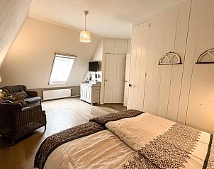 Gezellige slaapkamer in Vakantiehuisje in Oosterhesselen, met zithoek, Drenthe.