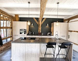 Moderne keuken in vakantiehuis Oosterhesselen, perfect voor een comfortabel verblijf in Drenthe.