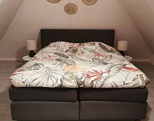 Comfortabele slaapkamer met tweepersoonsbed in Vakantiehuisje in Erm, Zuidoost Drenthe.