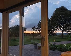 Adembenemend uitzicht bij zonsondergang vanuit Vakantiehuisje in Erm, Drenthe.