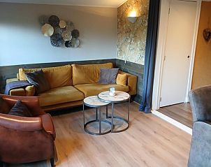 Gemtliches Wohnzimmer im Ferienhaus in Stieltjeskanaal, Sd-Ost Drenthe. Gemtliche Sitzecke, ideal zum Entspannen in einer lndlichen Umgebung.
