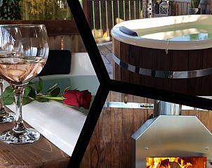 Romantische setting met jacuzzi en wijn in Vakantiehuis in Erica, Drenthe, ideaal voor een ontspannen verblijf.