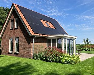 Charmant Huisje in Exlorveen, vakantieaccommodatie in Drenthe met zonnige veranda.