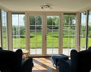 Binnenruimte van Huisje in Exlorveen, vakantiehuis met uitzicht op de natuur in Drenthe.