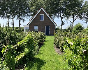 Slaapkamer met uitzicht in vakantiehuis DG1647, Exlorveen, Drenthe.