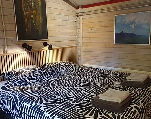 Sfeervolle slaapkamer in Vakantiehuisje in 't Haantje, Zuidoost Drenthe, met tweepersoonsbed.