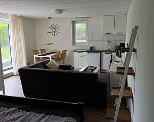 Gezellige woonkamer in Huisje in Emmer-Compascuum, vakantiehuis in Zuidoost Drenthe, Drenthe.
