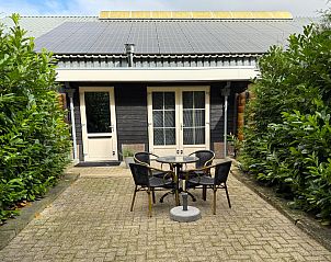 Ferienhaus DG2052 in Diever, Drenthe, mit sonniger Terrasse im Grnen, ideal fr entspannende Momente im Freien.