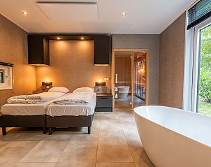 Verblijf 2007155 - Vakantiewoning Zuidwest Drenthe - Vakantiehuis De Wiltzangh - Bosrand Wellness Cabin Premium |