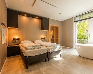 Verblijf 2007155 - Vakantiewoning Zuidwest Drenthe - Vakantiehuis De Wiltzangh - Bosrand Wellness Cabin Premium |
