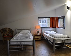 Die stilvolle Treppe im Ferienhaus DG567 in Dwingeloo, Drenthe, fhrt ins Obergeschoss.