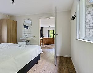 Comfortabele slaapkamer in Bungalow Pluto, Dwingeloo, Zuidwest Drenthe. Perfect voor een ontspannen verblijf.