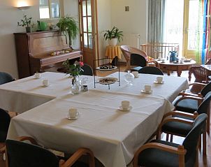 Eetkamer in Heimensteegde - 't Rustpunt, vakantiehuis in Wittelte, Zuidwest Drenthe met piano en lichte inrichting.