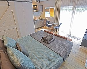 Slaapkamer van Huisje in Elim, vakantiehuis in Elim, Zuidwest Drenthe, met moderne inrichting en veel licht.