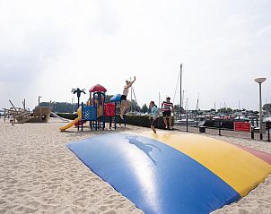 Playground and bouncy castle at Safaritent Wood, Biddinghuizen, for family fun in Flevoland.