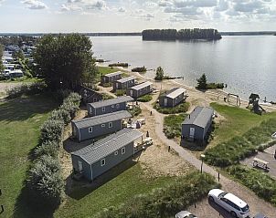 Uitzicht op het meer vanaf Strandhuisje | 4 Personen in Biddinghuizen, Flevoland