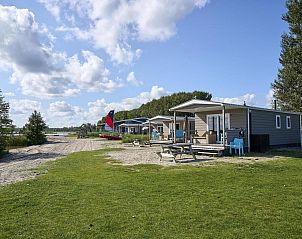 Strandhuisje | 4 Personen aan het strand met groene omgeving in Biddinghuizen, Oostelijk Flevoland