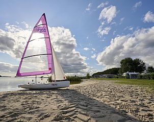 Gezellige woonkamer in Strandhuisje | 4 Personen in Biddinghuizen, Flevoland