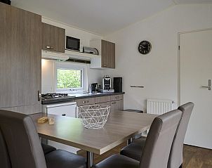 Spacious terrace of Mobile home | 6 Persons in Biddinghuizen, Eastern Flevoland. Enjoy the outdoors and the view.