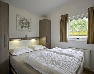 Master bedroom with comfortable bed in Mobile home | 6 Persons, Biddinghuizen, Eastern Flevoland.