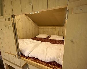 Gezellige slaapruimte in Safari Cottage, een vakantiehuis voor 4-6 personen in Biddinghuizen, Flevoland.