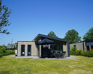 Vakantiehuis Cube Split 6 met ruime tuin, ideaal voor een ontspannen vakantie in Biddinghuizen, Flevoland.
