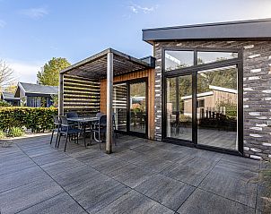 Enjoy the modern veranda of the Detached House in Biddinghuizen, a vacation home in the green Eastern Flevoland, Flevoland.