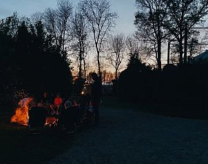 Evening campfire with friends at Holiday Home in Rutten, Eastern Flevoland, for an atmospheric night.