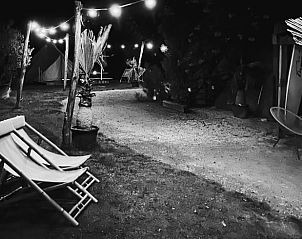 Illuminated garden at night at Holiday Home in Rutten, Eastern Flevoland, for a magical evening.