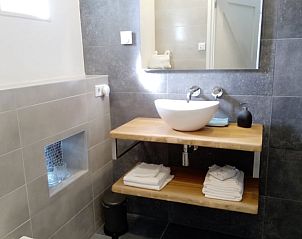 Luxury bathroom in Holiday home in Kraggenburg with modern amenities in Flevoland.