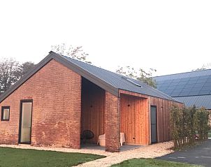 Charming exterior of Holiday Home in Kraggenburg, an inviting residence in Eastern Flevoland.