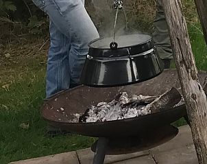Cooking over open fire at Holiday Home in Kraggenburg, an adventurous experience in Flevoland.