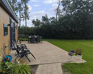Terrace at Holiday home in Kraggenburg with garden furniture in Eastern Flevoland, Flevoland.