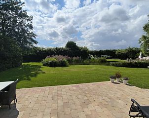 Spacious terrace overlooking garden at Holiday home in Kraggenburg, Eastern Flevoland, Flevoland.