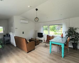 Interior of Holiday home in Kraggenburg with modern living room in Eastern Flevoland, Flevoland.