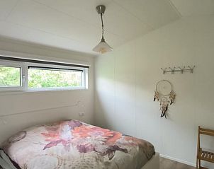Bedroom with double bed in Holiday Home in Kraggenburg, Eastern Flevoland, Flevoland.