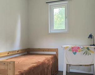 Small bedroom with single bed in Holiday home in Kraggenburg, Eastern Flevoland, Flevoland.