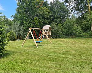 Playground in the green surroundings of cottage in Zeewolde, Southern Flevoland.