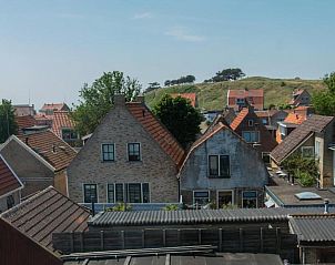 Uitzicht op de daken van West-Terschelling vanuit Hotel Oepkes, vakantieappartement op de Waddeneilanden.