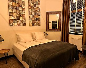 Comfortabele slaapkamer in Hotel Buren, vakantiehuis in West-Terschelling