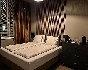 Gezellige slaapkamer in Hotel Buren, vakantieverblijf te Terschelling