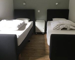 Comfortabele slaapkamer in Vakantiehuisje in Appelscha, een knus vakantiehuis in de Friese bossen, Friesland.