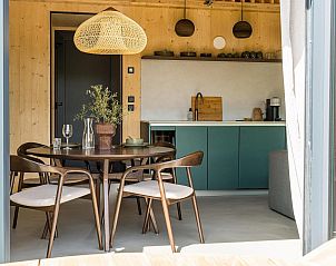 Stylish kitchen and dining area at Unbrick One vacation home in Appelscha, Frisian Woods, Friesland.
