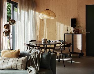 Comfortable sitting area in Unbrick One vacation home in Appelscha, Frisian Woods, Friesland.