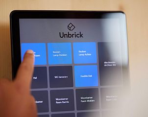 Smart home controls in Unbrick One vacation home in Appelscha, Friese bossen, Friesland.