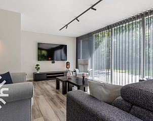 Zijaanzicht van vakantiehuis FR434 in Noordwolde, Friese bossen, Friesland.